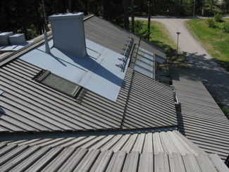 Palotarkastajat vaativat reilut pellitykset piipun ympärille - tervatulla lautakatteella on omat riskinsä..